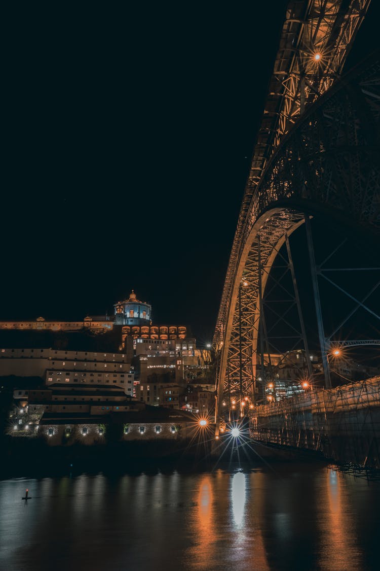 Illuminated Bridge During Night Time