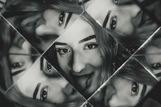 Captivating black-and-white portrait with kaleidoscope effect reflecting multiple woman faces.