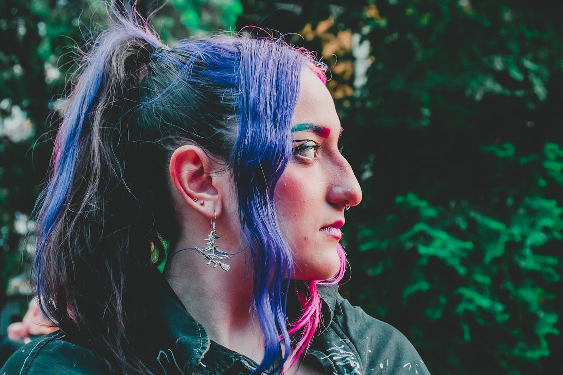 Close-up Photo of Stylish Woman with Pink hair