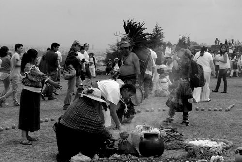Free A black and white photo capturing a traditional outdoor ceremony with diverse attire. Stock Photo