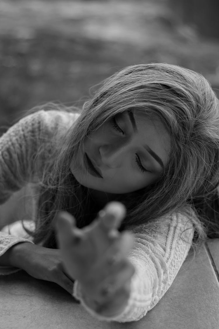 Woman Lying Down With Stretched Arm