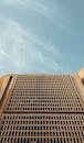 Brown Concrete Building Under the Blue Sky