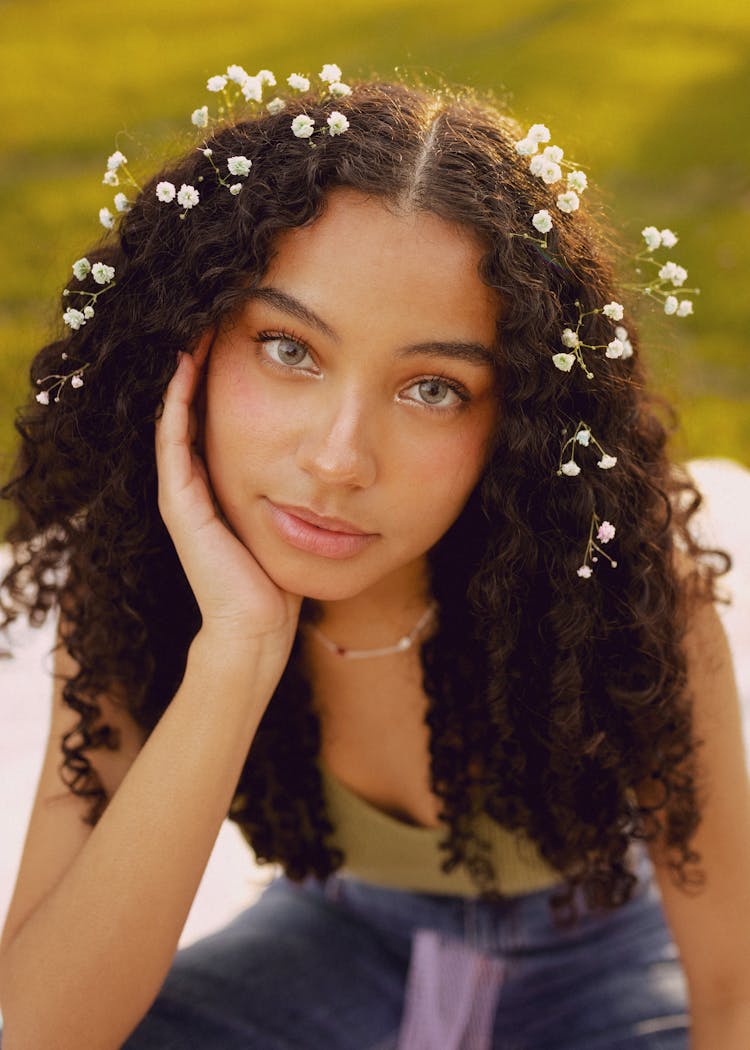 Portrait Of Woman With White Flowers In Hair