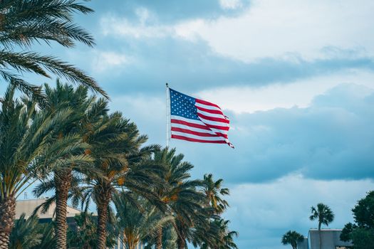 USA Flag on Flagpole Under Blue Sky