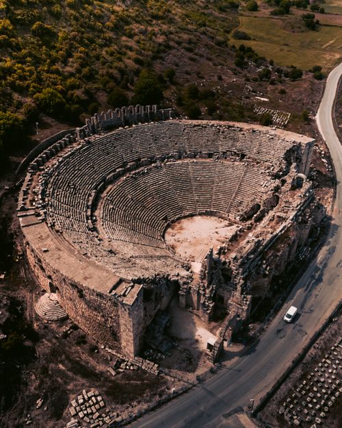 Free Discover the historic Aspendos Amphitheater, an ancient landmark in Turkey, from an aerial perspective. Stock Photo