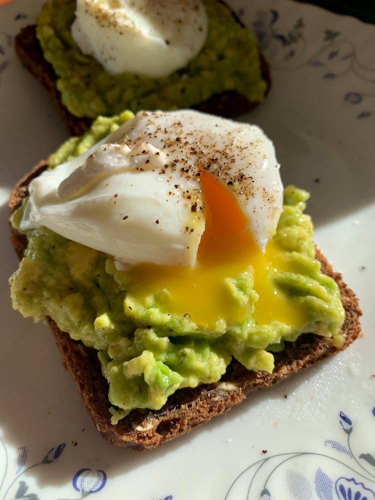 Poached Egg And Avocado On Toast Bread