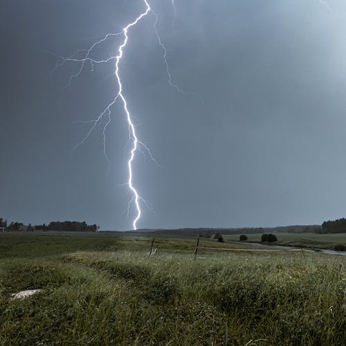 Free Lightning strike during a thunder storm Stock Photo
