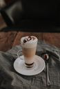 Tall Glass on Latte on Wooden Table