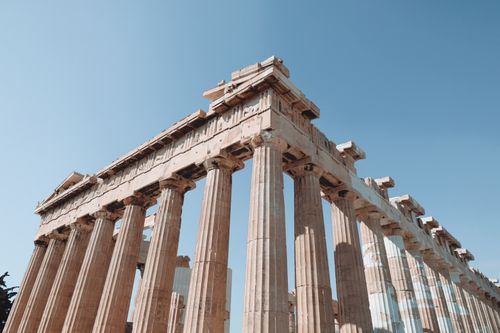Free Stunning low angle view of the Parthenon temple in Athens against a clear blue sky. Stock Photo
