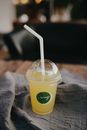 Clear Plastic Cup With Green Straw