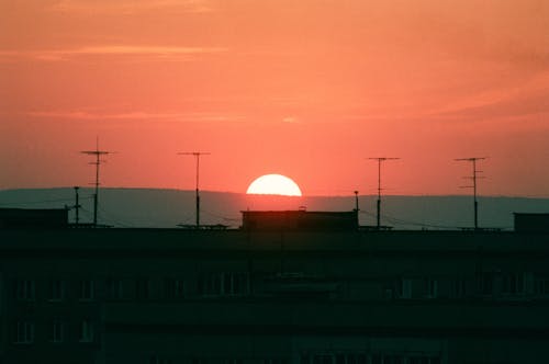 Silhouette of Antennas During Sunset