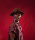 Man in Brown Hat and Black Shirt