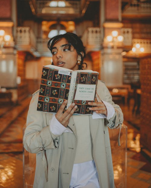 Woman holding a Book 