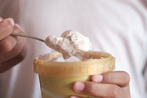 Close up of a Person Eating Ice Cream