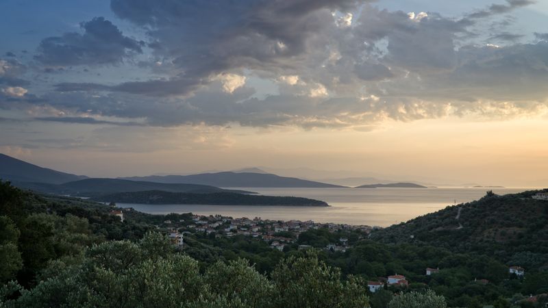 Mediterranean hills above a calm bay — mali maeder on Pexels