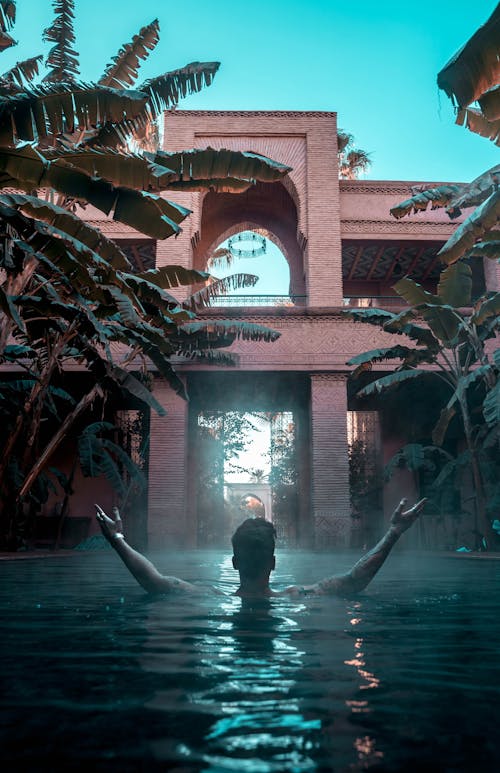 A Man Swimming in the Pool