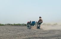 Plowing the farm field