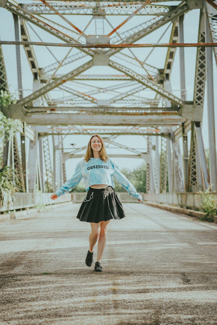 Happy Woman On Bridge