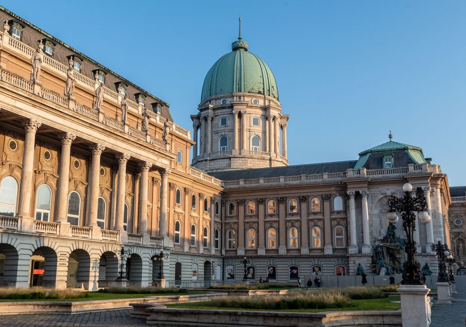 Exterior view of the historic Buda Castle in Budapest showcasing stunning Baroque architecture.