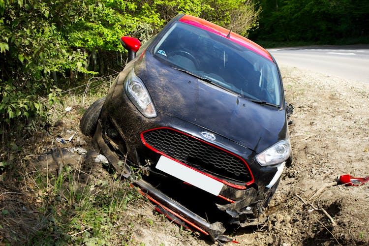 Crash Car On Sand Near Road 