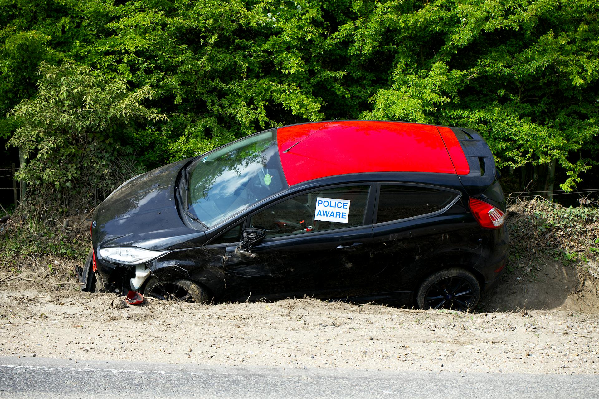 Broken Car on Verge