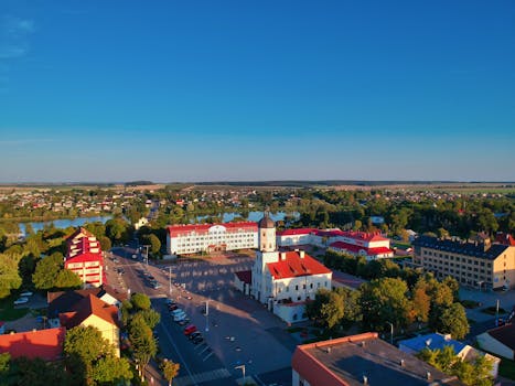 Stunning morning aerial view of Niasviž town hall and surrounding landscapes in Belarus.