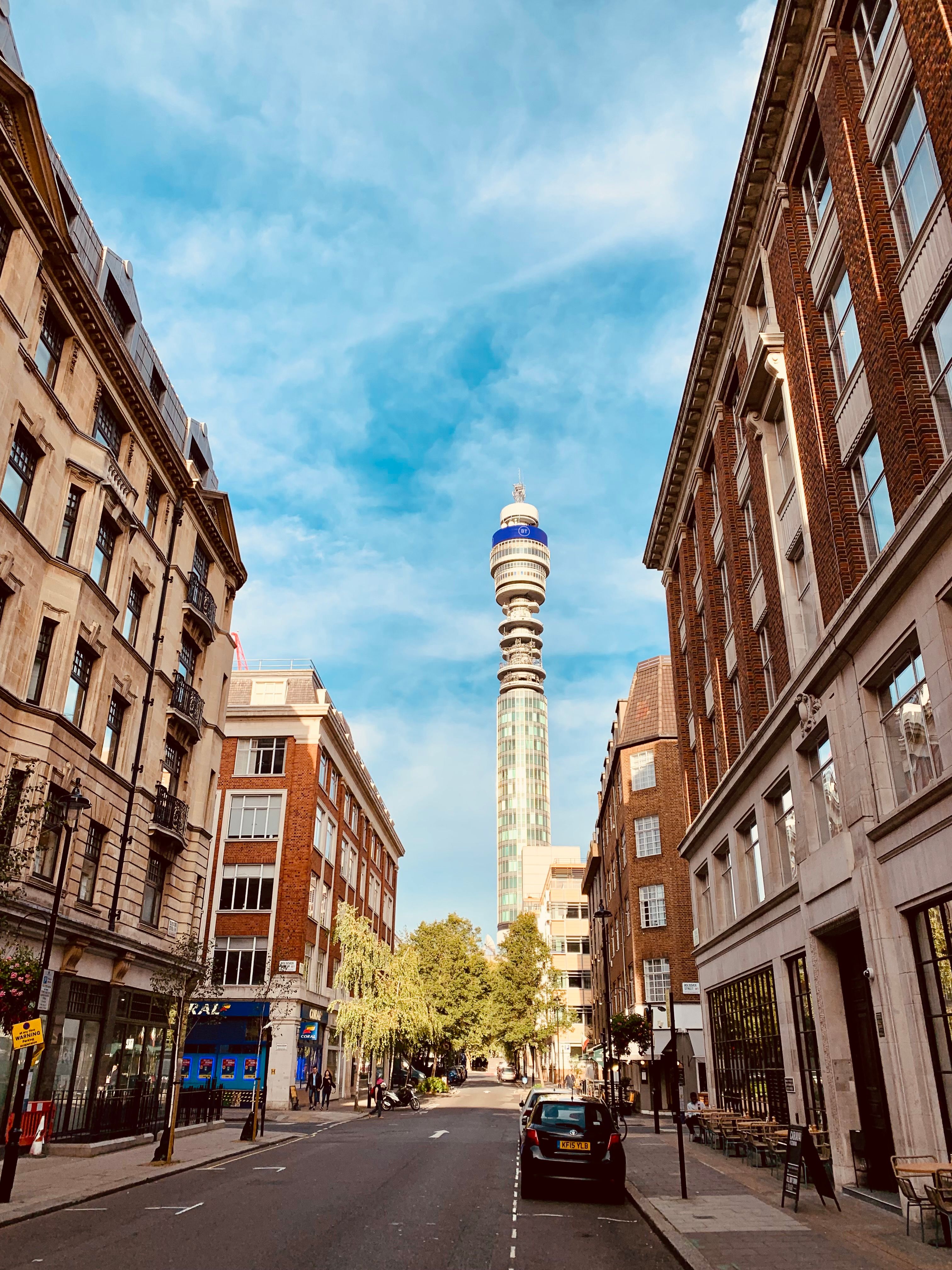 Explore the BT Tower in London's cityscape with urban streets and historic architecture.