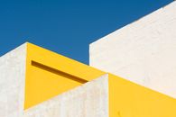 Yellow Concrete Building Under Blue Sky