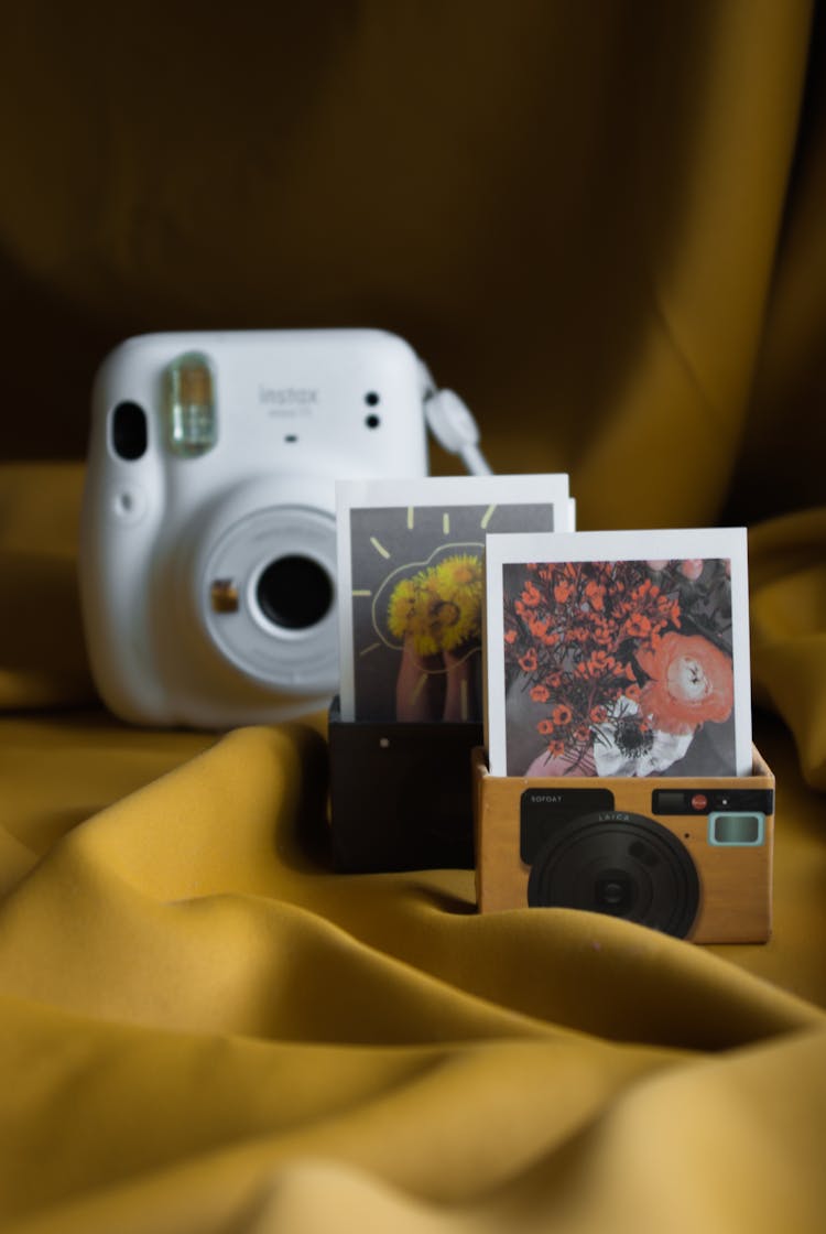 Instax Camera And Polaroid Prints