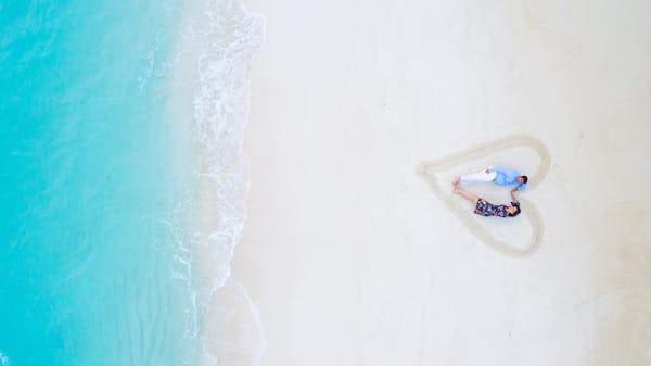 Happy couple on the islands beach image of Ifuru beach