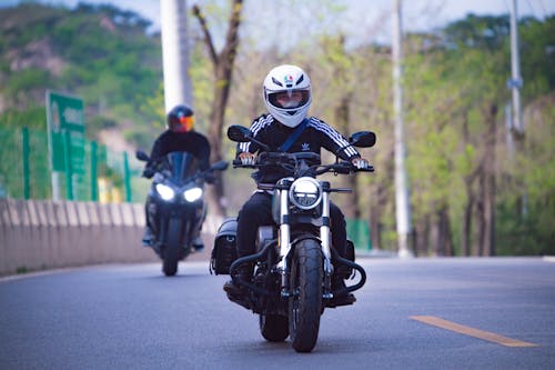 Free Bikers on the Road Riding Big Motorcycles Stock Photo