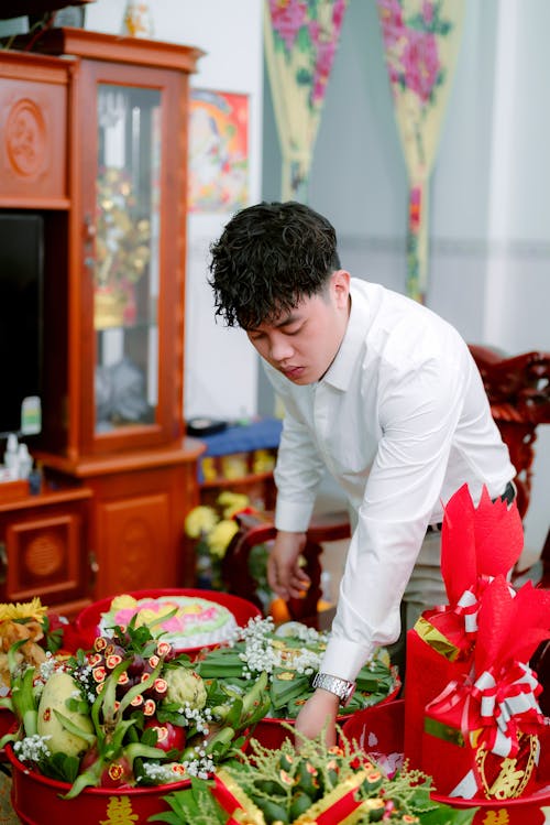 Man Arranging Flowers