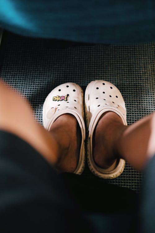 Feet in Foam Clogs