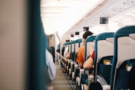 People Sitting on Gray Seats Inside Train