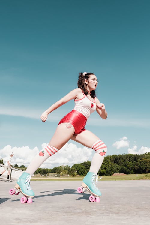 Woman Rollerskating in Skate Park