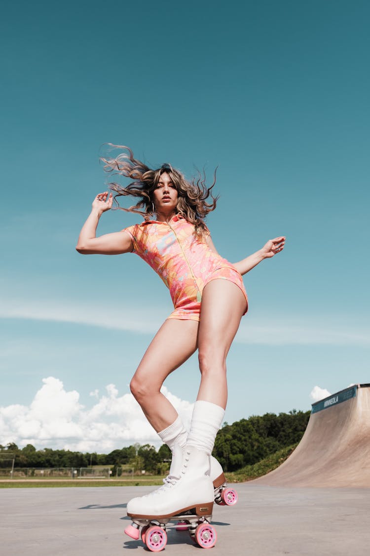 Low Angle Shot Of Rollerskating Woman