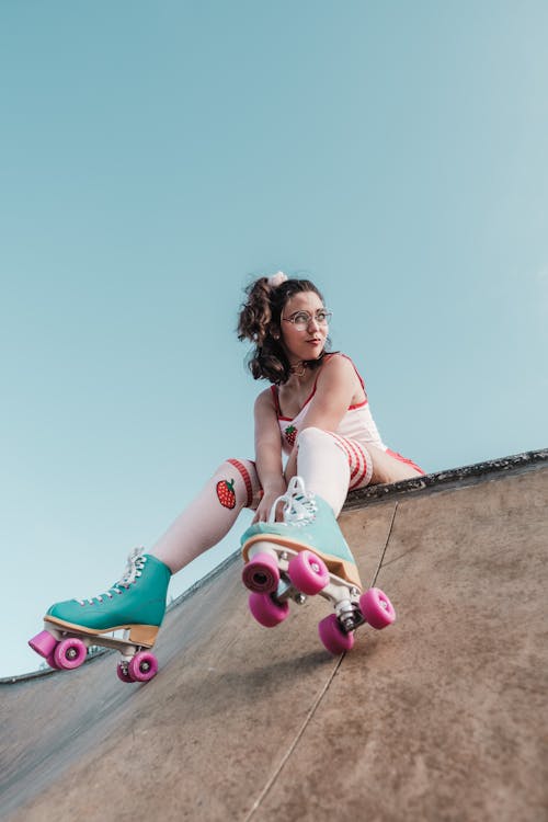 Little girl rollerblading hi-res stock photography and images