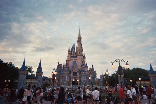 People Visiting Disneyland Castle