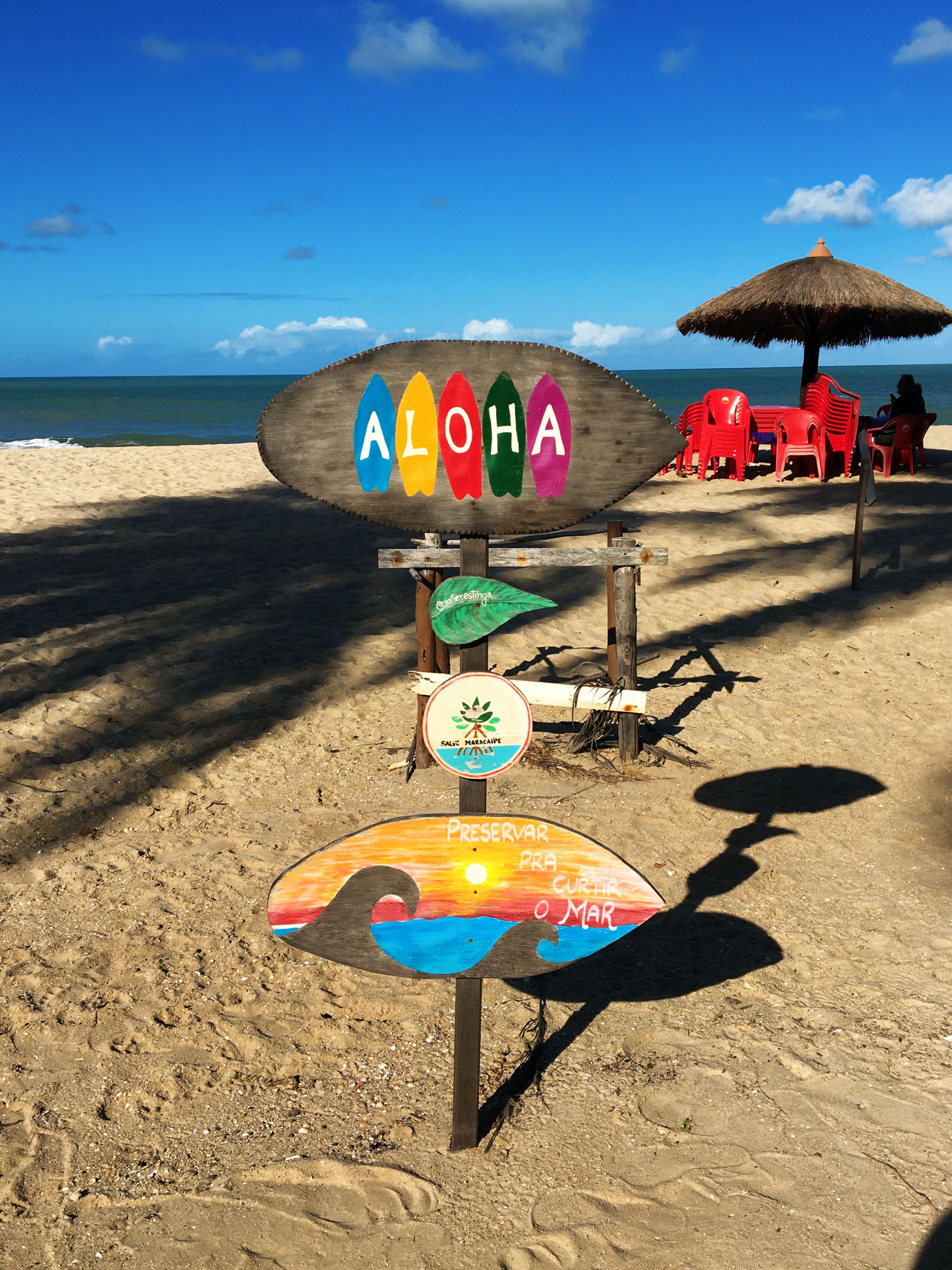 Wooden Sign on a Beach · Free Stock Photo