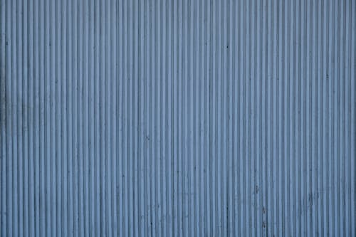 Close-Up Shot of a Blue Concrete Wall