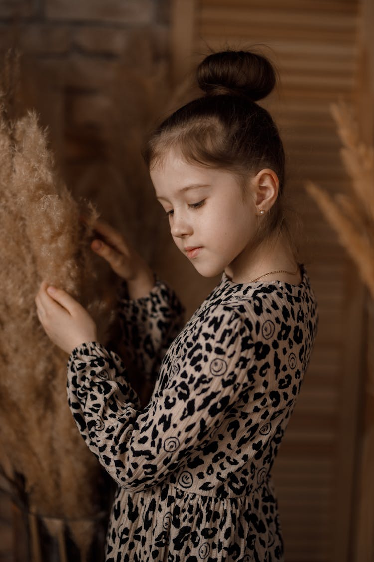 Small Girl Posing In Studio