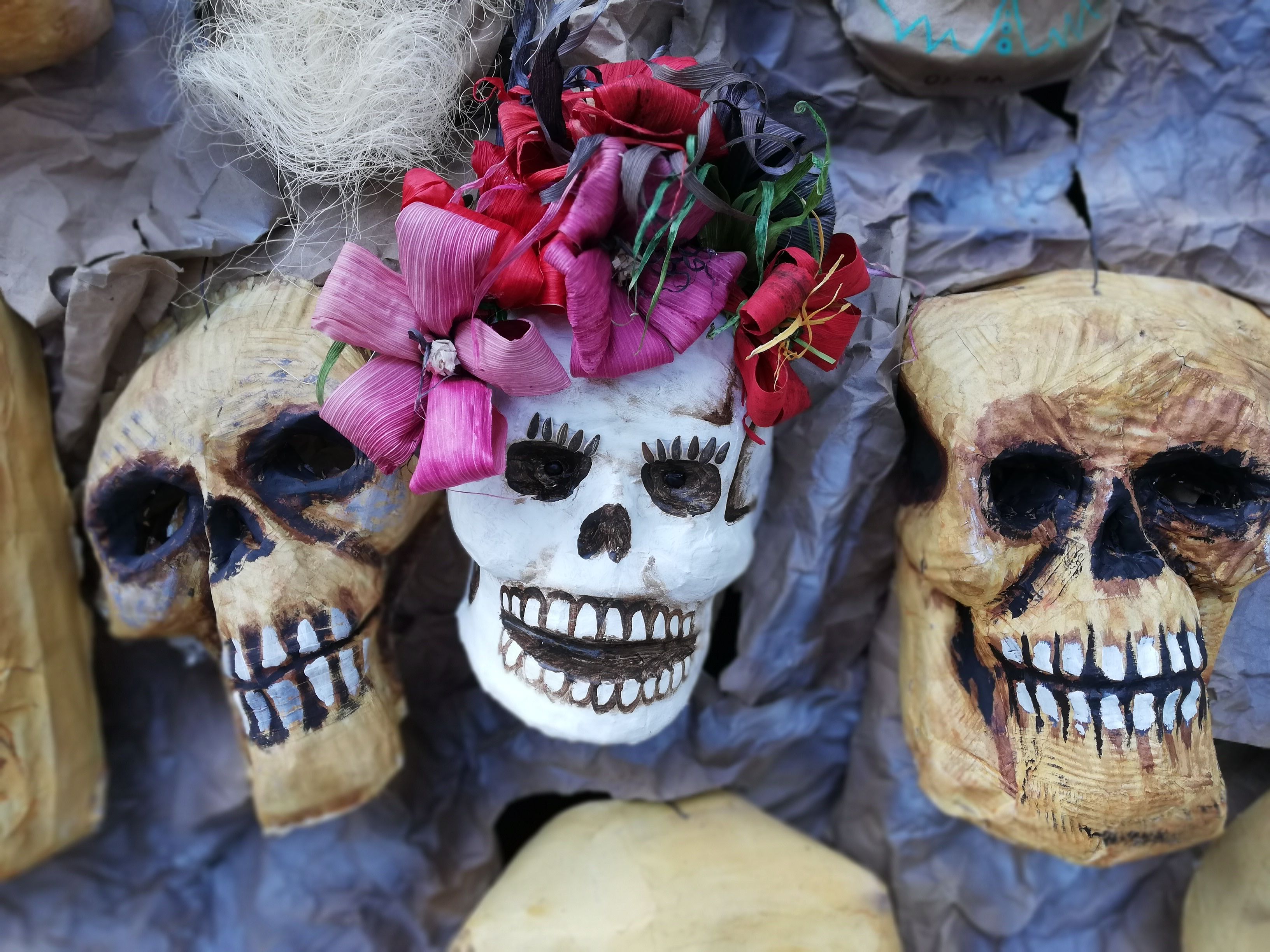 Decorative skulls with flowers for Day of the Dead celebration in Mexico City.