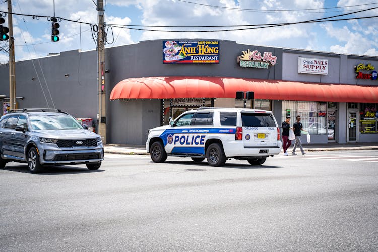 Police Car On Town Street