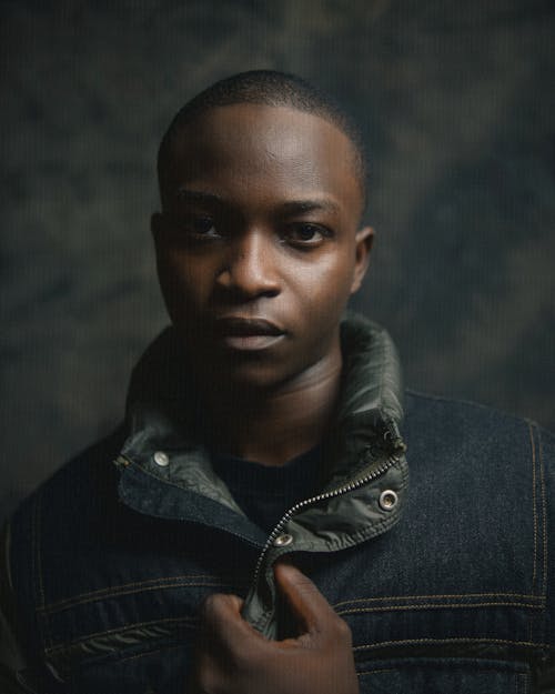 Portrait of Young Man in Denim Jacket