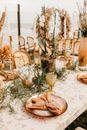 Table Decorated with Flowers and Candles