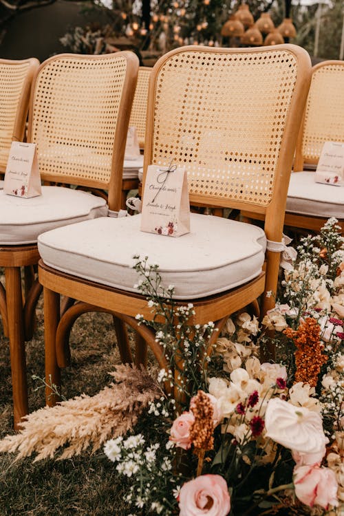 Seats and Flower Arrangement on an Outdoor Wedding Venue 