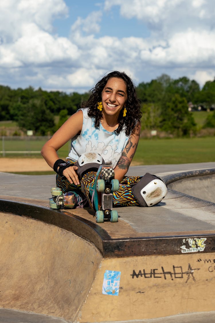 Woman Putting On Roller Skates