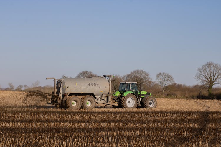 Tractor Delivering Slurry Onto A Field