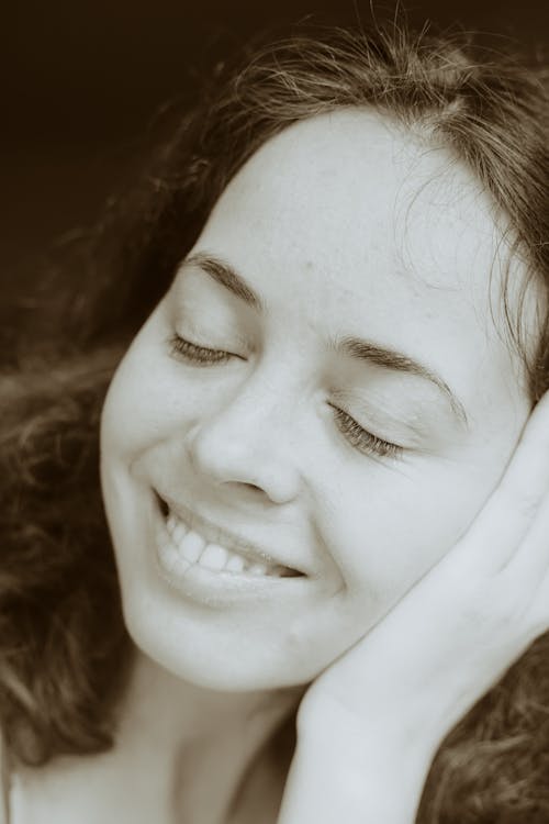 Close Up Shot of a Woman Smiling