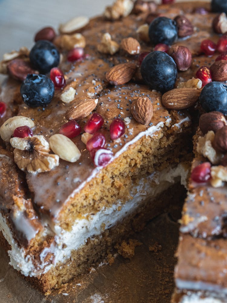 Healthy Homemade Cake With Fruit And Nut Toppings